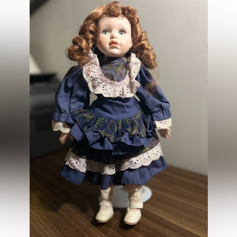 Vintage Porcelain Doll Red Hair Traditional Outfit On a Stand